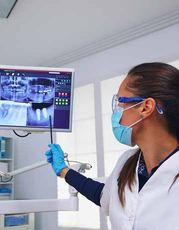 Dentist Educating Patient